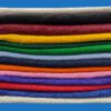 A Pile of Multi Color Napkins in a Stack