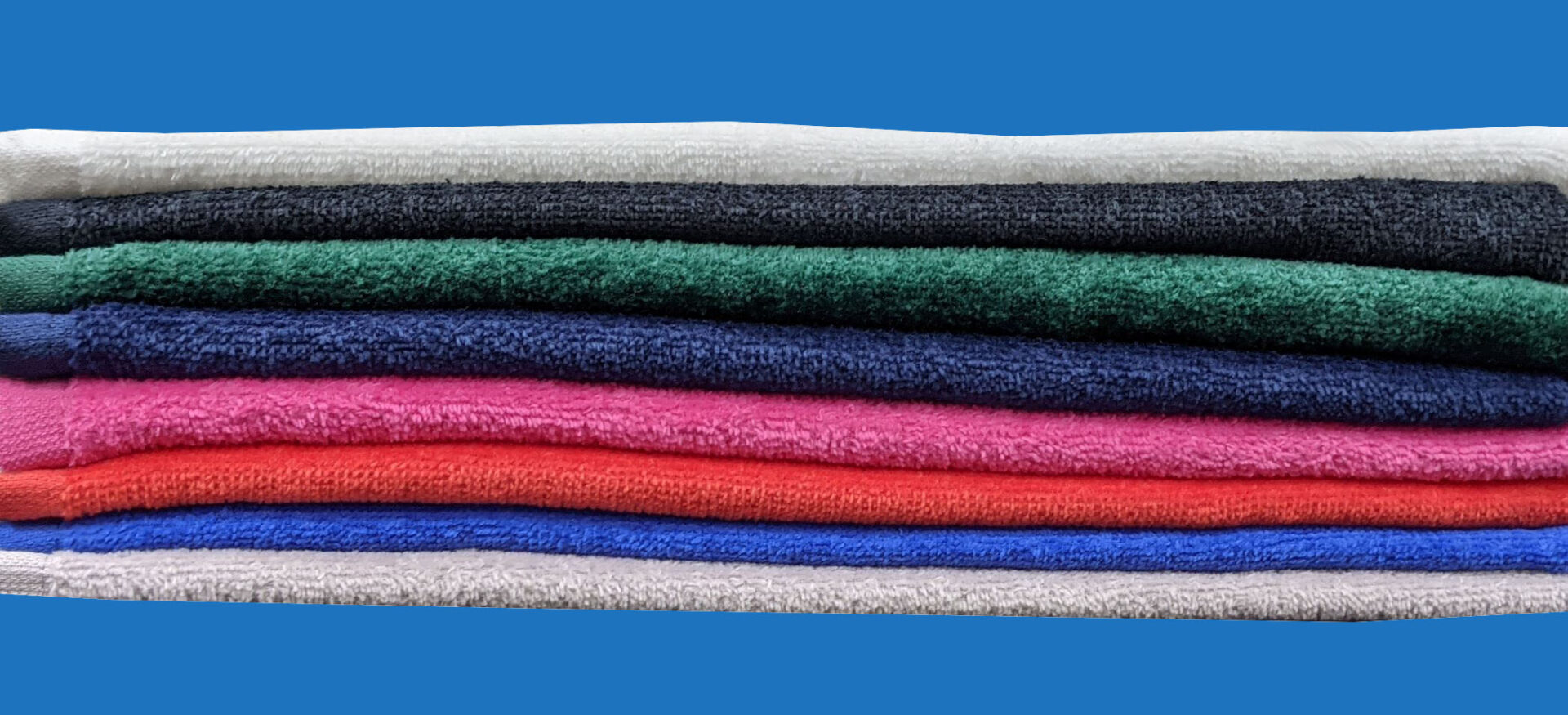 Colorful kitchen towels stacked on each other