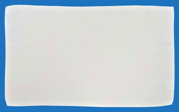 A White Towel Placed on a Blue Background