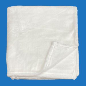 A Folded White Fluffy Blanket With Stitched Edges