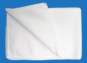 A Blank White Color Folded Towel With Hemmed Edge