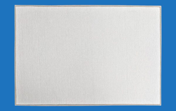 A White Rectangular Towle Laid on Blue Surface